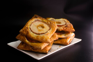 Puff pastry with apple and cream cheese. Dessert. Pastry. Bread