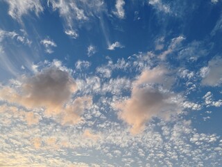 Cloudy SKY, Ornamental clouds, Blue SKY with light of sunshine having small and large clouds, Blue...