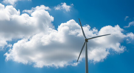 Wind Turbine Under Blue Sky with Puffy Clouds for Renewable Energy Concept in Bright Sunny Weather