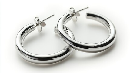 Thin silver hoop earrings with clean modern lines, isolated on white background