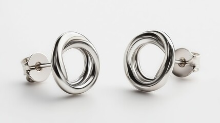 Clean double-circle earrings in platinum, isolated on white background