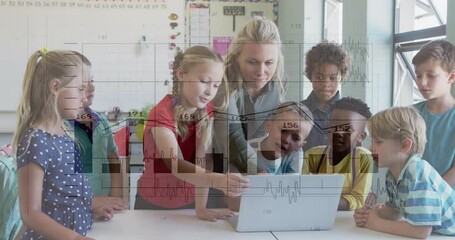 female teacher guiding students around laptop in education classroom, showing animated chart icons - Powered by Adobe