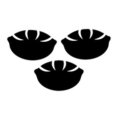 A Trio of Abstract Black Fruit Halves, Representing a Symbolic Harvest