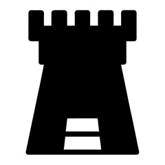 Black silhouette of a castle tower with crenellations and an entrance