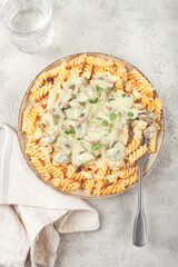 fusilli pasta, with champignons, in creamy garlic sauce, with herbs and spices, sauce, no people,