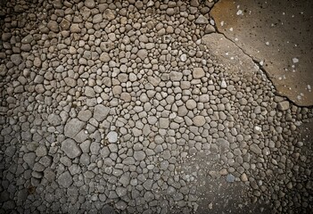 A close up of a pile of rocks on a beach.