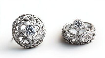 Vintage-inspired platinum jewelry set with intricate scrollwork and brilliant diamonds on earrings, necklace, and ring, isolate on white background