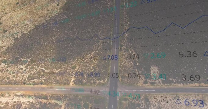 Displaying aerial T?intersection road network cutting arid scrubland with data grid overlays