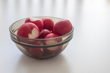 Healthy raw vegetables. Red radish in a bowl