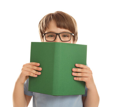 Little boy with book on white background