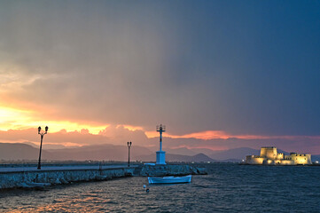 Sunset over Bourtzi water fortress in Nafplio city, Peloponnese, Greece
