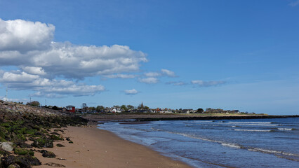 Looking down the sandy beach at Carnoustie, towards the small hamlet of Westhaven at the northern end of Carnoustie Bay.