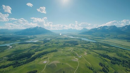 Obraz premium Breathtaking aerial vista, soaring above majestic mountains and valleys from an airplane window