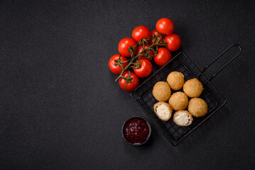 Cheese fried balls or croquettes with potatoes or rice