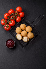 Cheese fried balls or croquettes with potatoes or rice