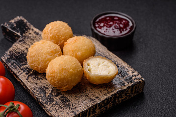 Cheese fried balls or croquettes with potatoes or rice