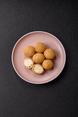 Cheese fried balls or croquettes with potatoes or rice