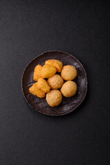 Fried mozzarella or brie cheese with cranberry or raspberry sauce