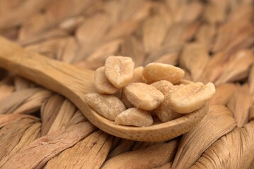 Peanuts, granola, and roasted nuts on neutral background – healthy snack and protein source
