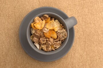 Peanuts, granola, and roasted nuts on neutral background – healthy snack and protein source