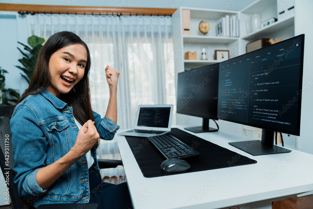 Poster young asian it developer creating raising fist up with successful information on pc with coding prog