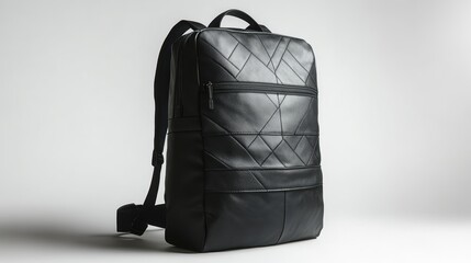 Naklejka premium Black backpack with artistic geometric patterns, durable construction, and water-resistant finish, isolate on white background