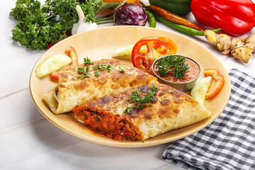 Mexican cuisine - chicken burrito with beans