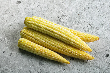Raw sweet baby corn heap