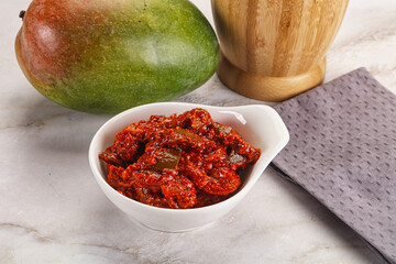 Spicy pickled raw green mango
