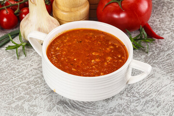 Hot tomato soup with diced chicken