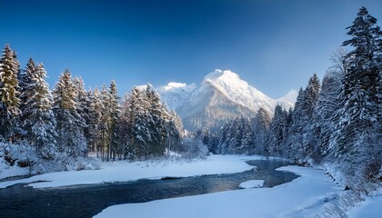 Fototapeta premium winter forest with a river and a beautiful mountain