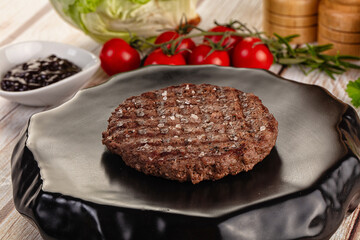 Grilled juicy beef cutlet for burger