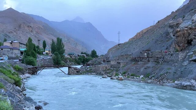 Old villages in Tajikistan. Tajikistan's road along the Zeravshan River near the Pamir highway. Old stone villages in the mountains of the Silk Road. 4К