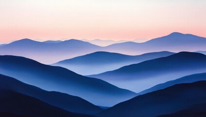 Misty mountain range at sunrise