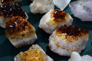 Beautiful citrine crystal cluster at a stone fair. Natural citrine druse at a stone fair