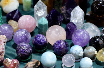 Beautiful balls and obelisks of aquamarines, rose quartz and amethysts at the stone exhibition....