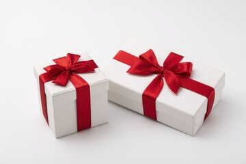 Obraz premium Blank card beside gift boxes with red ribbons for holiday promotions and reward programs