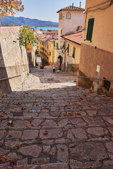 The narrow streets of the old town. Portoferraio is a popular travel destination in Italy. Elba...