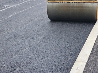 Roadworks, Road construction. Paving roller on roadworks at construction site, paving works.