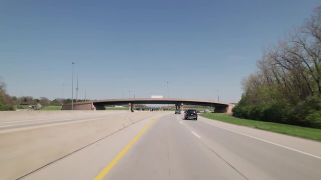Car traffic driving on multiple lanes highway and interstate 315 and 270 belt outside Columbus, Ohio in midwest American roadway turnpike near northern city traffic by Worthington, OH