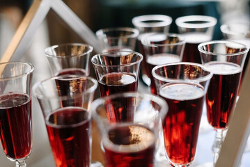 glasses of red wine at buffet