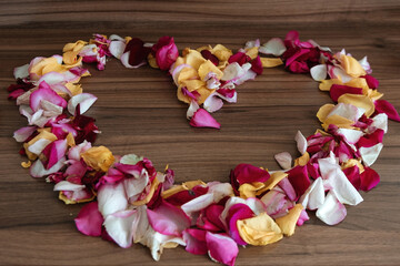 petals in heart-shape, heart made of rose petals, beautiful decoration