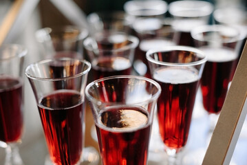 glasses of red wine at buffet