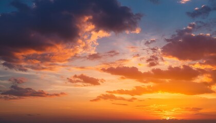 Naklejka premium beautiful colorful bright sunset sky with orange clouds nature sky background
