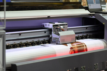 Large format printing machine in operation.