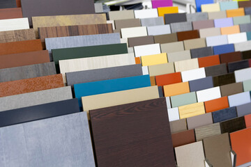 Multi-colored samples of composite materials for the ventilated facades in showroom
