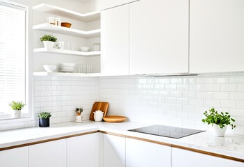 A kitchen with white cabinets and a black sink.