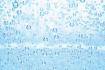 Soda water with bubbles as background, closeup