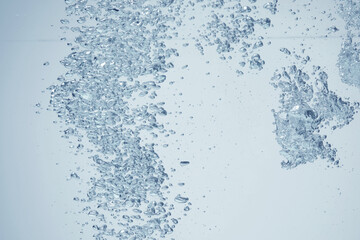Soda water with bubbles as background, closeup