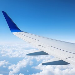 Obraz premium Airplane Wing Above Cloudscape Stunning Aerial View